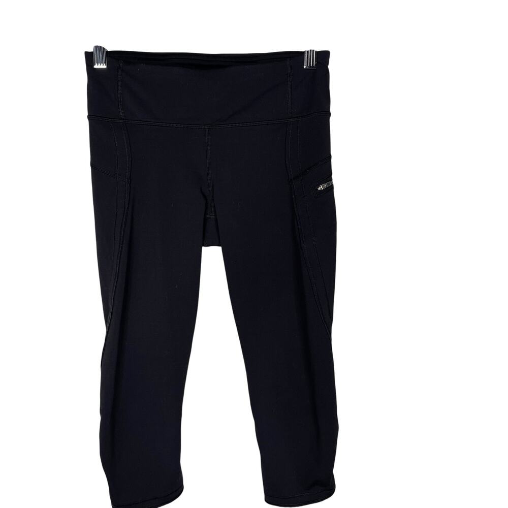 Lululemon Womens 4 Black Tulip Back Hem Cropped Capri Leggings Workout